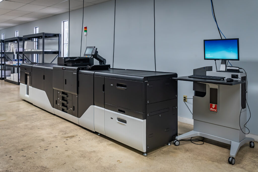 Digital production press and workstation at the Solo Printing facility in Miami